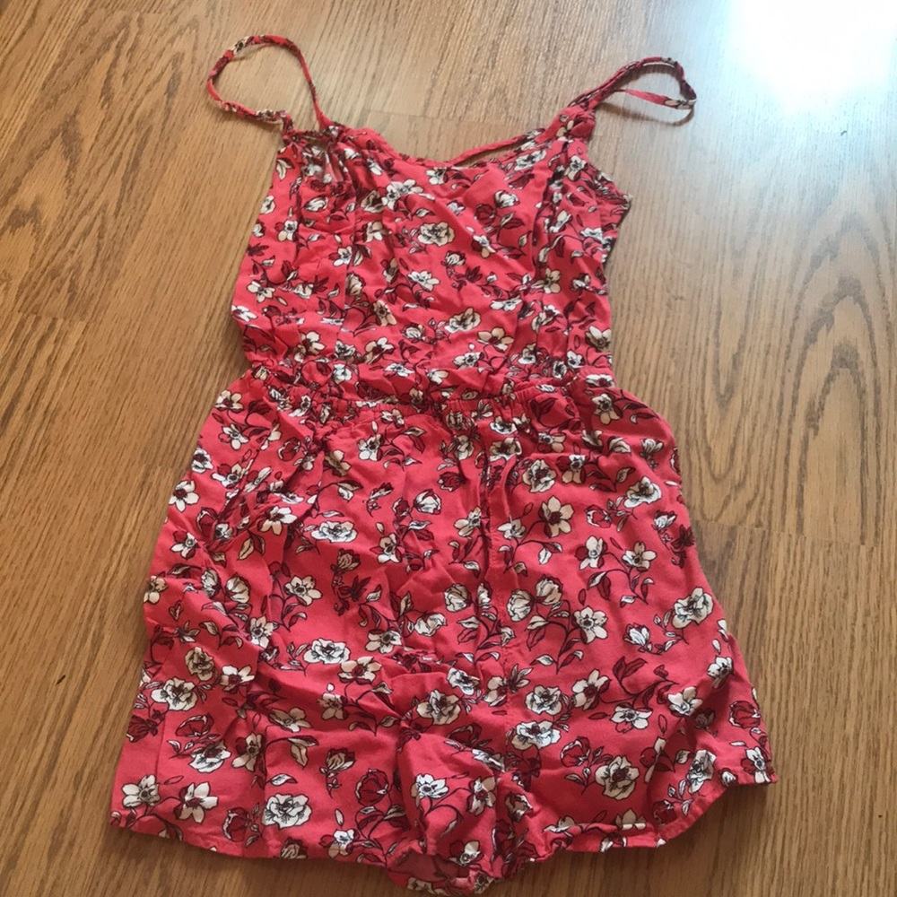 Pink romper with pockets